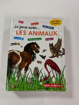 une image représentant un livre sur lequel figurent des animaux et des oiseaux