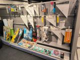 a lot of items on the shelves in the store