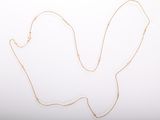 gold plated chain necklace with a butterfly pendant on a white background