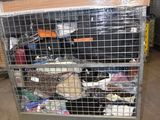 a metal cart with many items in it in a garage