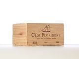 a wooden box that has a wine bottle in it