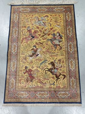 a yellow and blue rug with a picture of people riding horses