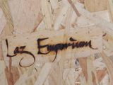 a wooden sign that says la egyptiana on it