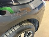 a close up of a car with a sticker on it