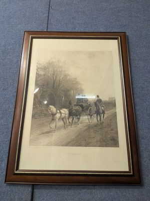 photo encadrée représentant une calèche tirée par des chevaux sur un chemin de terre