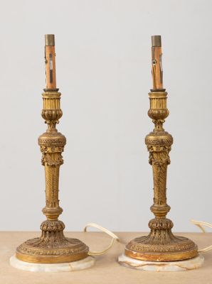 pair of antique brass candlesticks with marble bases