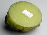 a piece of fruit that has a sticker on it
