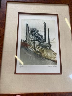 a picture of a picture of a soldier sitting on the ground
