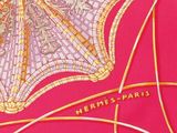 pink silk scarf with a gold and white butterfly on a pink background