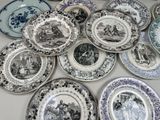 a lot of plates that are sitting on a table