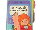 a picture of a children ' s book with a picture of a child ' s foot