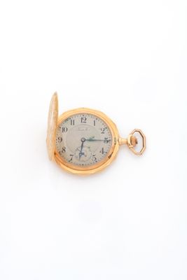 pocket watch on a white surface with a white background