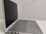 a laptop that is sitting on a white table