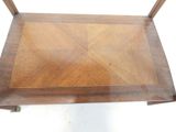 an image of a wooden table with a square wooden top