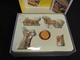 a box with a set of five figurines in it