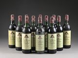 six bottles of wine are lined up in a row