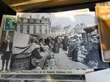 a black and white photo of a market with people