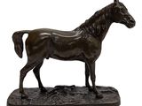 bronze statue of a horse on a base on a white background