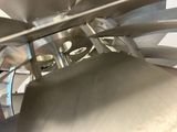 a large metal object that is inside of a building