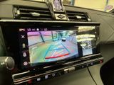 a picture of a car dashboard with a camera on it