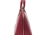 a red handbag on a white background with a zipper