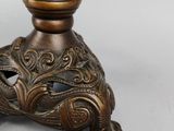 an image of a close up of a table with a vase on it