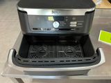 an image of a kitchen appliance with two deep fryers