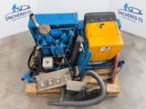 an image of a blue and yellow engine sitting on top of a wooden pallet