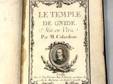un vieux livre sur lequel figure l'image d'un homme portant une couronne