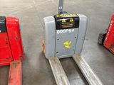 three forklifts in a warehouse with a red fork