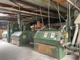 two machines that are sitting in a building