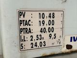 a sign on the side of a refrigerator that says ptac