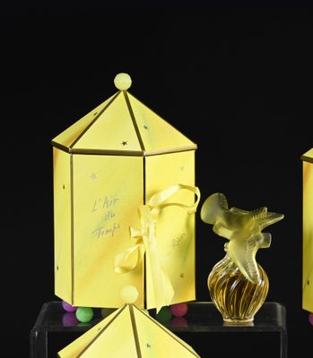 three yellow boxes with a bird on top of them