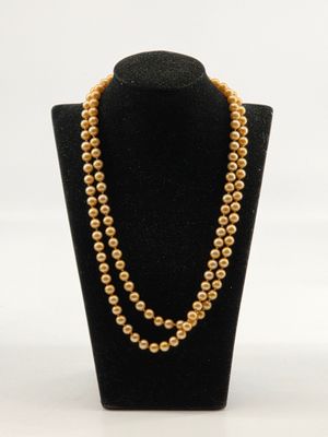 COLLIER perles d'imitation à deux rangs.