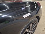 a car that has a sticker on the side of it