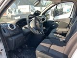 the interior of a car with a steering wheel and a dashboard
