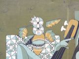 a painting of a man playing a guitar on the side of a building