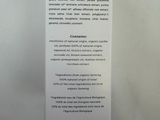 the back of a box with a label on it on a white surface