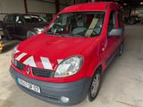 a red van that is parked in a garage