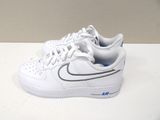 white nike air force sneakers with blue accents on a white surface