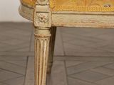 an image of a chair with a yellow and red upholstered seat