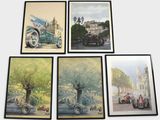 four framed pictures of old cars on a wall in a room