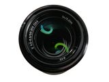 a close up of a camera lens on a white background