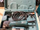 a tool in the case that is sitting on the table