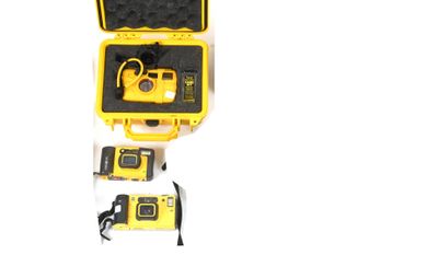an image of a yellow and black box with tools in it