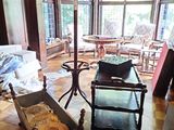 an image of a living room with a lot of furniture in it