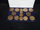 a box with a lot of gold coins in it