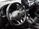 the interior of a car with a steering wheel, dashboard, and dash board