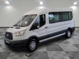 a picture of a white van parked in a room