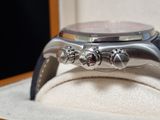 a watch that is sitting in a box on a table